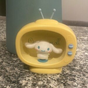 Yellow TV Figurine Decor with White Character